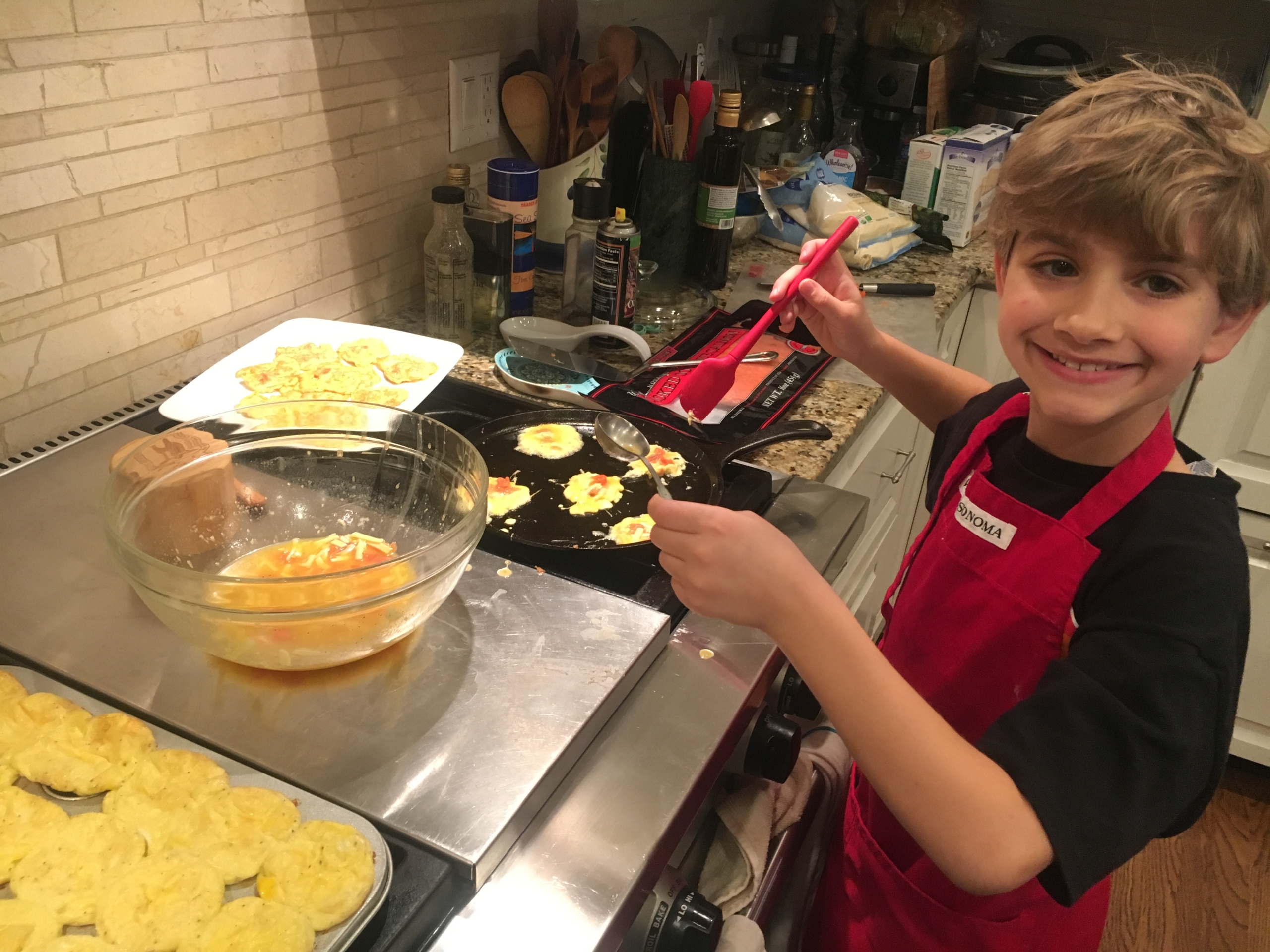 Benji making egg muffins Benji making egg muffins